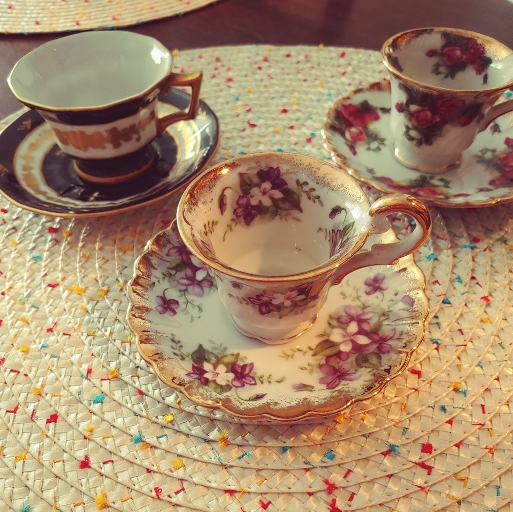 Miniature tea cups and saucers